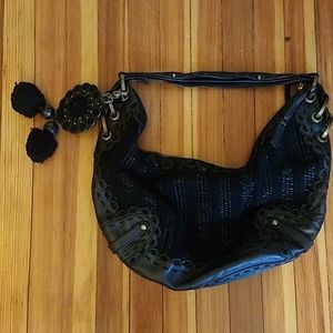 Isabella Fiore leather purse, roomy, tassels.